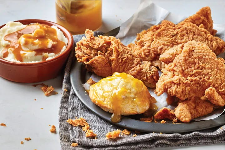 Bone-in chicken Krunch Box with honey biscuit and mashed potatoes
