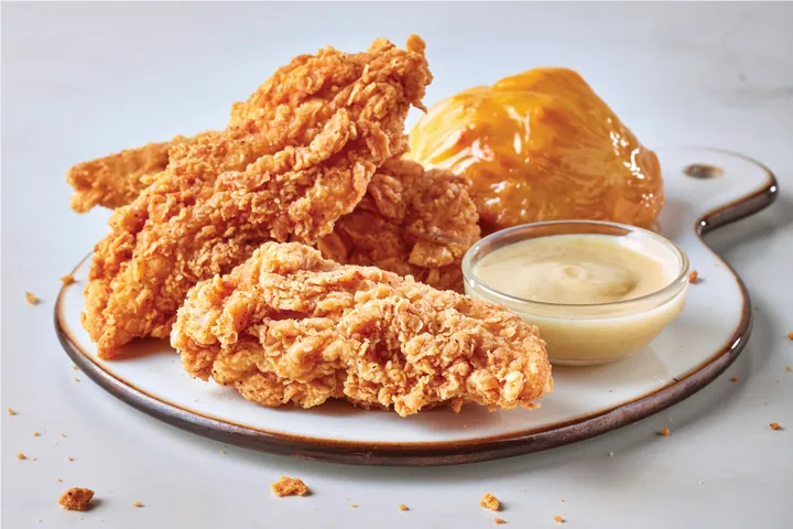 Cajun tenders with a honey biscuit and dipping sauce